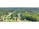 Aerial image of a cozy neighborhood, showcasing the home nestled in a beautiful wooded setting at 320 Silverbell Ln, Sharpsburg, GA 30277
