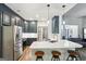 Beautiful kitchen with stainless steel appliances, a large island, and sleek cabinetry at 320 Silverbell Ln, Sharpsburg, GA 30277