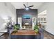 Spacious living room boasts a modern fireplace and an open concept design, perfect for entertaining at 320 Silverbell Ln, Sharpsburg, GA 30277