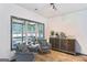 Bright sitting area with comfortable seating, a decorative accent table, and a coffee and beverage bar at 320 Silverbell Ln, Sharpsburg, GA 30277