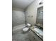Bright bathroom featuring a shower over tub with a granite sink top at 9107 Morris Sw Dr, Covington, GA 30014