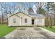 Charming single-story home with a well-maintained front yard and a concrete driveway at 9107 Morris Sw Dr, Covington, GA 30014