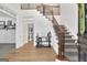 Bright and airy foyer with hardwood floors and staircase at 425 Birkdale Dr, Fayetteville, GA 30215