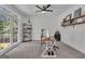 Bright office with large window, carpeted floors and custom shelving at 425 Birkdale Dr, Fayetteville, GA 30215