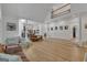 Spacious living room with hardwood floors, soaring ceilings, and an open concept layout perfect for entertaining at 425 Birkdale Dr, Fayetteville, GA 30215