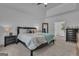 Comfortable primary bedroom with decorative molding, a ceiling fan, carpet floors, and a doorway to an ensuite at 425 Birkdale Dr, Fayetteville, GA 30215