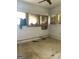An unfurnished bedroom with hardwood floors and window air conditioner at 301 Wedowee St, Bowdon, GA 30108