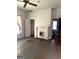 Living room features an antique fireplace and access to closet and other rooms at 301 Wedowee St, Bowdon, GA 30108