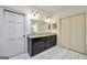 Bathroom with a double vanity, tile flooring, and neutral paint at 123 Eva Ln, Stockbridge, GA 30281