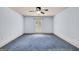 Bedroom with a ceiling fan and a window with white shutter-style blinds at 123 Eva Ln, Stockbridge, GA 30281
