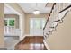 Welcoming foyer with hardwood floors, a staircase, and a decorative glass door at 123 Eva Ln, Stockbridge, GA 30281