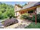 Stone walkway and lush landscaping leading to the charming front porch at 123 Eva Ln, Stockbridge, GA 30281
