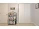 Bedroom featuring neutral paint, bookshelves, and a large closet at 345 Summer Pl, Peachtree City, GA 30269