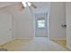 Bedroom featuring neutral paint, ceiling fan, and natural light through the window at 345 Summer Pl, Peachtree City, GA 30269