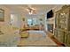 Spacious living room with plush seating, hardwood floors, a ceiling fan, and natural light at 345 Summer Pl, Peachtree City, GA 30269