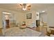 Inviting living room with hardwood floors, a neutral color palette, and comfortable seating, offering a relaxed atmosphere at 345 Summer Pl, Peachtree City, GA 30269