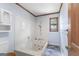 Bathroom features a marble-look bathtub with jets at 1919 Lake Lucerne Sw Way, Lilburn, GA 30047