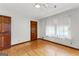 Bright bedroom with hardwood floors, and a ceiling fan at 110 Mourning Dove S Dr, Fayetteville, GA 30215