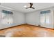 Bedroom with hardwood floors, ceiling fan, and lots of light at 110 Mourning Dove S Dr, Fayetteville, GA 30215