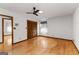 Bedroom with hardwood floors, closet, and a doorway leading to another room at 110 Mourning Dove S Dr, Fayetteville, GA 30215