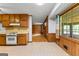 Functional kitchen next to the breakfast nook and featuring vintage style flooring at 110 Mourning Dove S Dr, Fayetteville, GA 30215