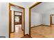 Bright, open-concept living room featuring hardwood floors and a view into the dining area at 110 Mourning Dove S Dr, Fayetteville, GA 30215