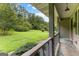 Inviting front porch with views of the lush greenery and landscape at 110 Mourning Dove S Dr, Fayetteville, GA 30215