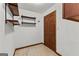 Practical storage room featuring shelving and a durable tile floor at 110 Mourning Dove S Dr, Fayetteville, GA 30215