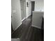 Bathroom featuring a glass shower, wood-style floors, and modern fixtures at 5753 Barrington Run # 114, Union City, GA 30291