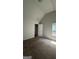 Spacious bedroom featuring a closet, window, and plush carpeting at 5753 Barrington Run # 114, Union City, GA 30291