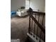 Spacious living room featuring a modern sectional couch and plush carpeting at 5753 Barrington Run # 114, Union City, GA 30291