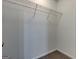 Walk-in closet featuring carpeted floor and wire shelving for efficient storage at 1735 Deer Crossing Cir, Jonesboro, GA 30236