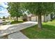 Exterior shot of a brick home with a two-car garage and spacious front yard at 1735 Deer Crossing Cir, Jonesboro, GA 30236