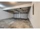 Spacious two-car garage featuring concrete flooring and gray doors at 1735 Deer Crossing Cir, Jonesboro, GA 30236