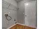 Utility room with wood floor and hookups at 1735 Deer Crossing Cir, Jonesboro, GA 30236