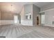 Open living room with neutral paint, decorative molding, and newer carpeting at 1735 Deer Crossing Cir, Jonesboro, GA 30236