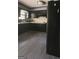 Modern kitchen featuring sleek black cabinetry and updated appliances at 491 Allana Ct, Stone Mountain, GA 30087