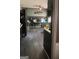 View of a sleek kitchen that leads to an open area at 491 Allana Ct, Stone Mountain, GA 30087