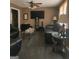 Cozy living room featuring leather seating and a sleek entertainment center at 491 Allana Ct, Stone Mountain, GA 30087