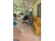 Enclosed patio area with seating and outdoor equipment at 491 Allana Ct, Stone Mountain, GA 30087