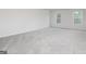 Spacious bedroom with plush carpeting and ample natural light at 282 Limestone Circle, Conyers, GA 30013