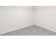 Empty carpeted walk-in closet with wire shelving at 282 Limestone Circle, Conyers, GA 30013