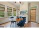 Cozy dining area with a fireplace and large windows, perfect for Gathering meals at 1484 Mcpherson Se Ave, Atlanta, GA 30316