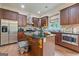Modern kitchen featuring stainless steel appliances, granite countertops, and an island at 1484 Mcpherson Se Ave, Atlanta, GA 30316