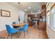 Open-concept kitchen featuring an island and a breakfast nook filled with natural light at 1484 Mcpherson Se Ave, Atlanta, GA 30316