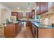Gourmet kitchen featuring stainless steel appliances, granite countertops, and custom cabinetry at 1484 Mcpherson Se Ave, Atlanta, GA 30316