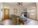 Comfortable living room with hardwood floors, lots of natural light and a stylish green sofa at 1484 Mcpherson Se Ave, Atlanta, GA 30316