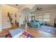 Bright and airy living room featuring hardwood floors and large windows, creating a warm and inviting atmosphere at 1484 Mcpherson Se Ave, Atlanta, GA 30316