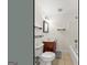 Functional bathroom featuring a vanity, toilet, tub, and shower combination, providing essential amenities at 1833 S Highway 92, Fayetteville, GA 30215