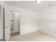 Carpeted bedroom with closet and access to ensuite bathroom at 1833 S Highway 92, Fayetteville, GA 30215